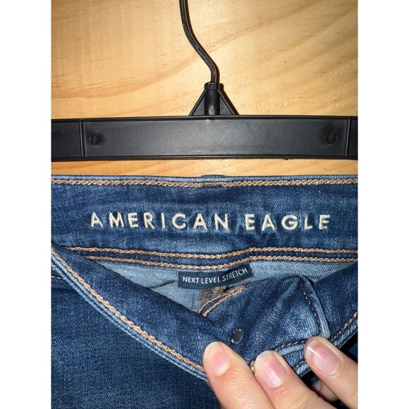 Women's AEO Next Level Stretch Mid-Wash Distressed Bootcut Jeans - Picture 5 of 6